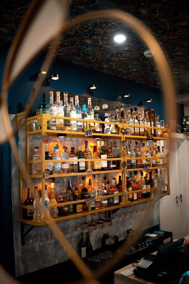 Wall of tequila and mezcal bottles at Agave Cocktail Lab